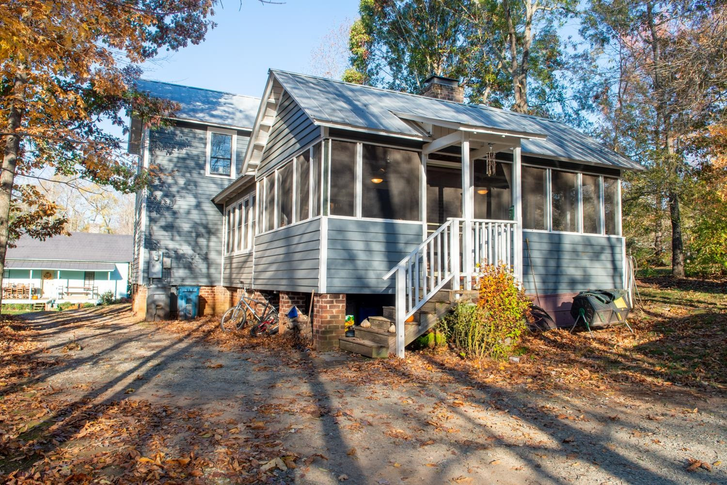 2417 Hodges Road Burlington, NC 27217 - Photo 27 of 30 a view of a house with a yard and porch