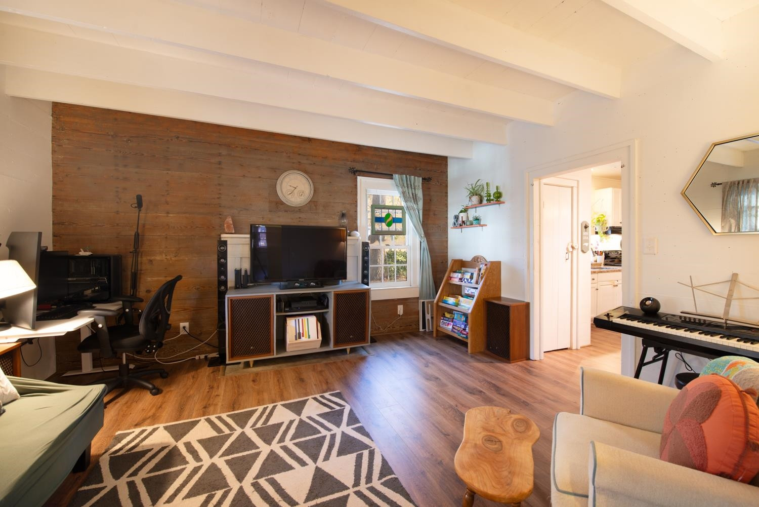 2417 Hodges Road Burlington, NC 27217 - Photo 4 of 30 a living room with furniture and a flat screen tv