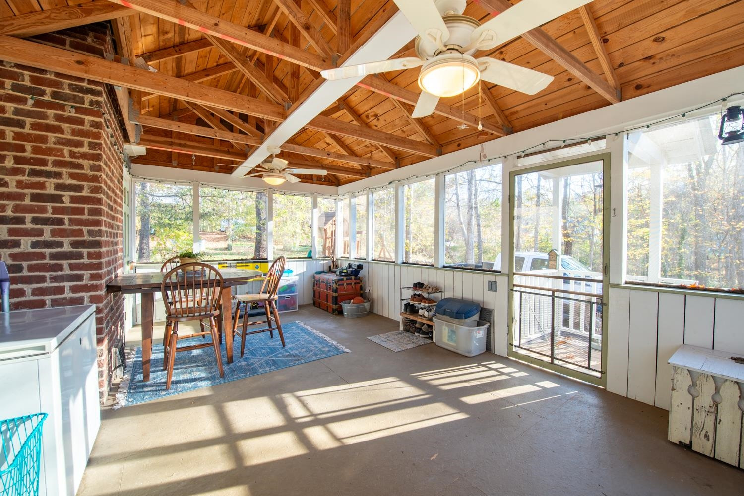 2417 Hodges Road Burlington, NC 27217 - Photo 9 of 30 a dining room with furniture water view and a fireplace