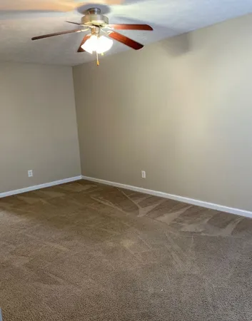 a view of a small space with a fan