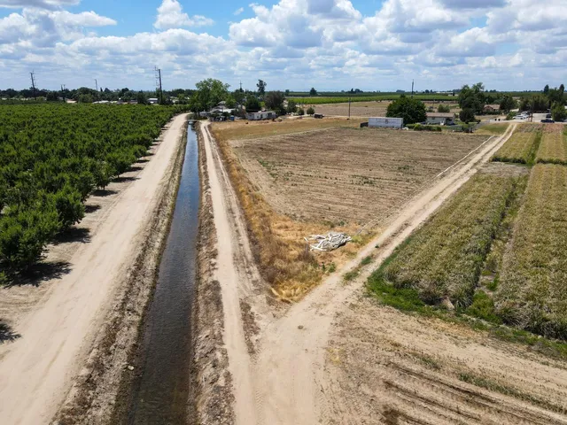a view of swimming pool with a yard
