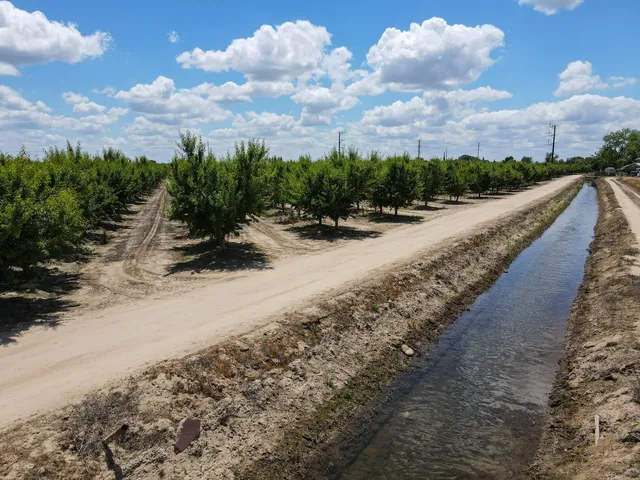 a view of a road with a yard