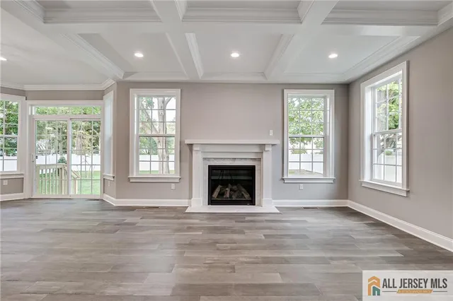 a view of kitchen with furniture and fireplace