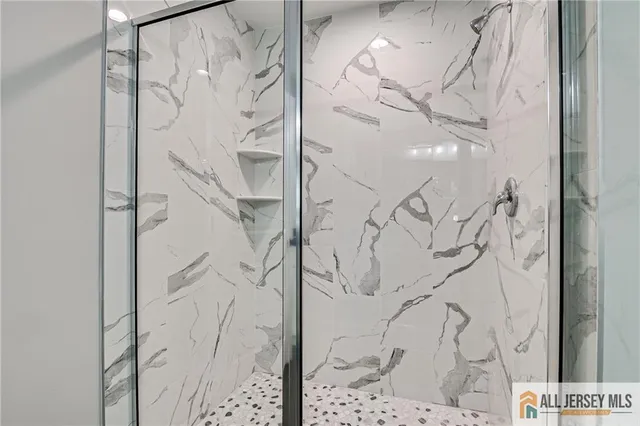 a white bath tub sitting next to a window