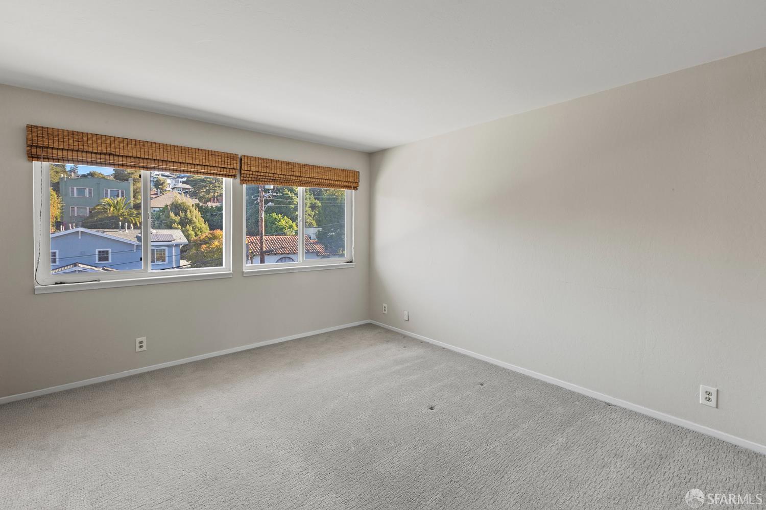 1059 El Centro Avenue, Unit 3 Oakland, CA 94602 - Photo 13 of 25 an empty room with windows