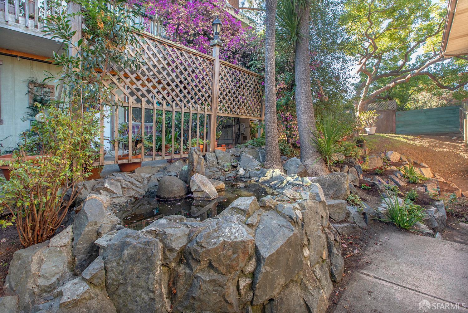 1059 El Centro Avenue, Unit 3 Oakland, CA 94602 - Photo 21 of 25 a view of a house with a yard