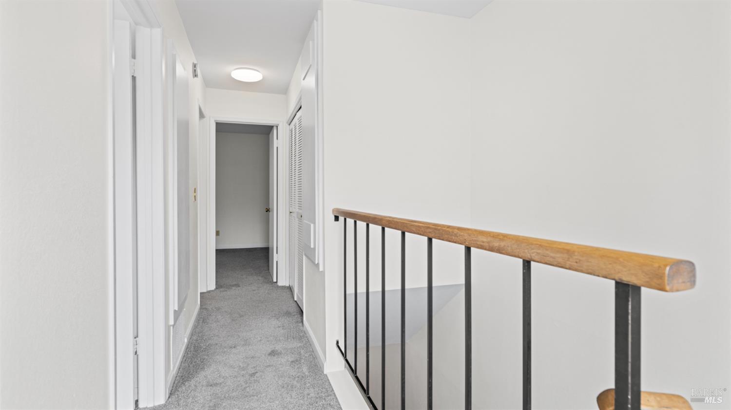 19 Burdell Court Novato, CA 94949 - Photo 15 of 30 a view of a hallway with wooden floor and entryway