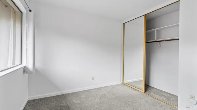 an empty room with closet