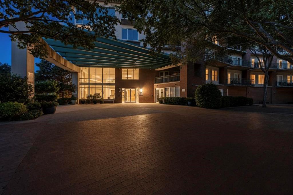 5055 Addison Circle, Unit 736 Addison, TX 75001 - Photo 26 of 34 a view of a building with a street