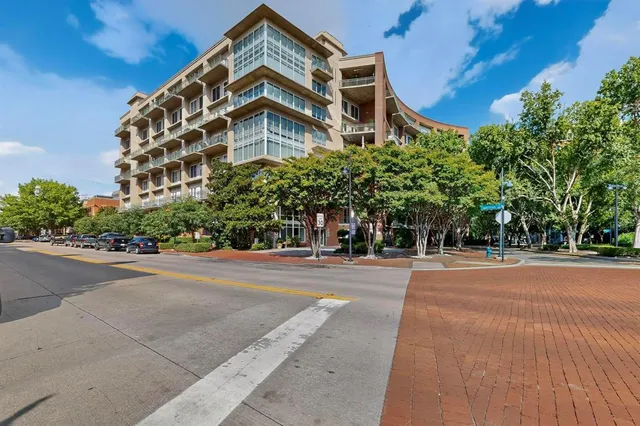 a view of a building with a street