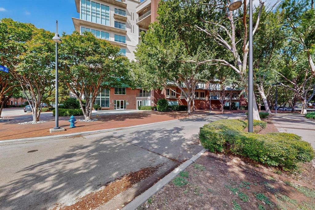 5055 Addison Circle, Unit 736 Addison, TX 75001 - Photo 31 of 34 a view of road with trees
