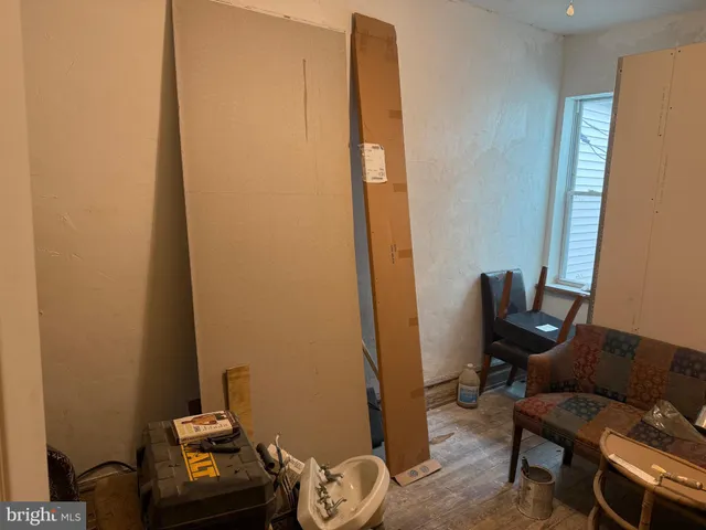 a backyard of a house with outdoor seating