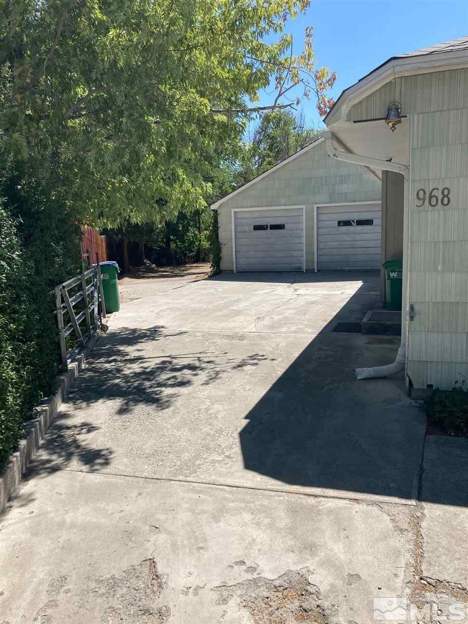 968 Gear Street Reno, NV 89503 - Photo 3 of 19 a front view of a house with a yard