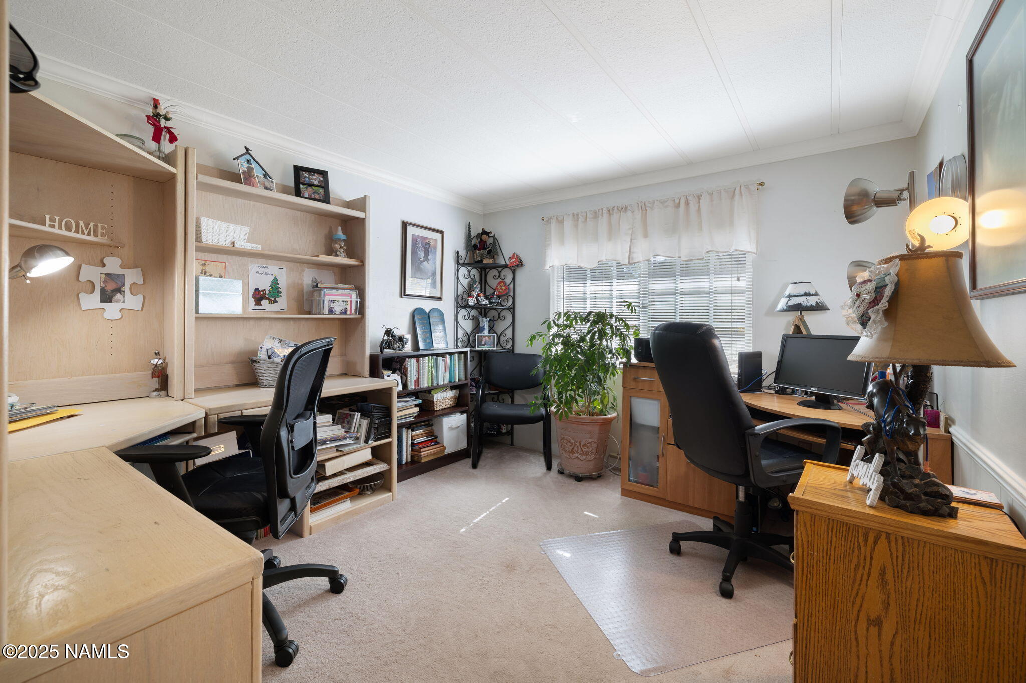 2401 West Rte 66 Flagstaff, AZ 86001 - Photo 23 of 47 a view of a workspace with furniture and a window
