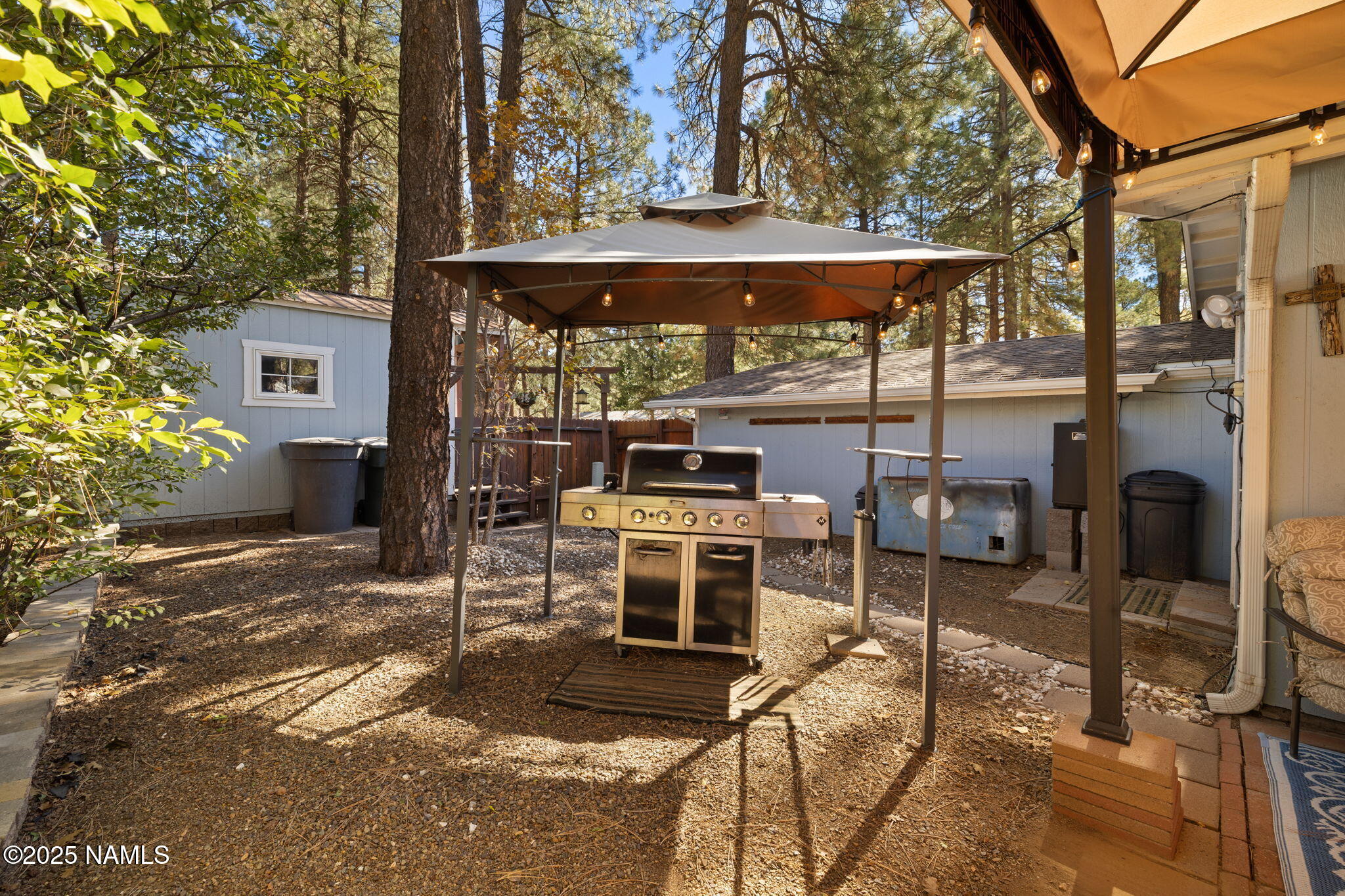 2401 West Rte 66 Flagstaff, AZ 86001 - Photo 34 of 47 a view of a chairs and table in the patio
