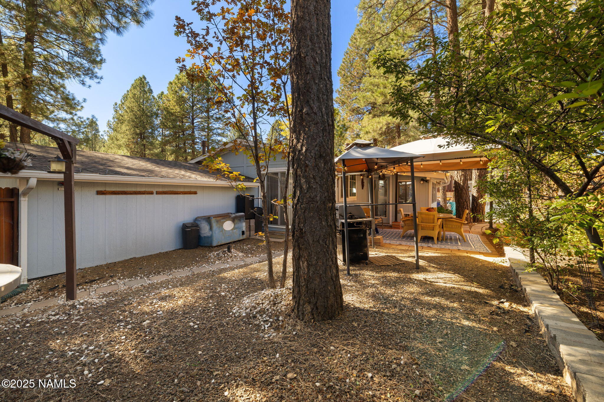 2401 West Rte 66 Flagstaff, AZ 86001 - Photo 35 of 47 a view of a house with a yard