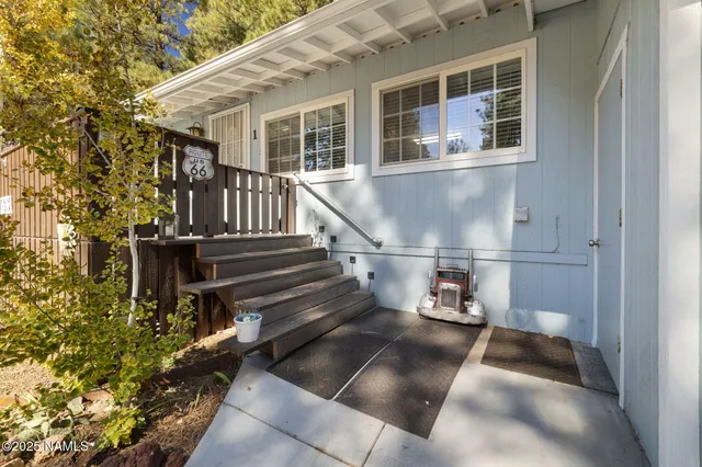 a view of entryway with a front door