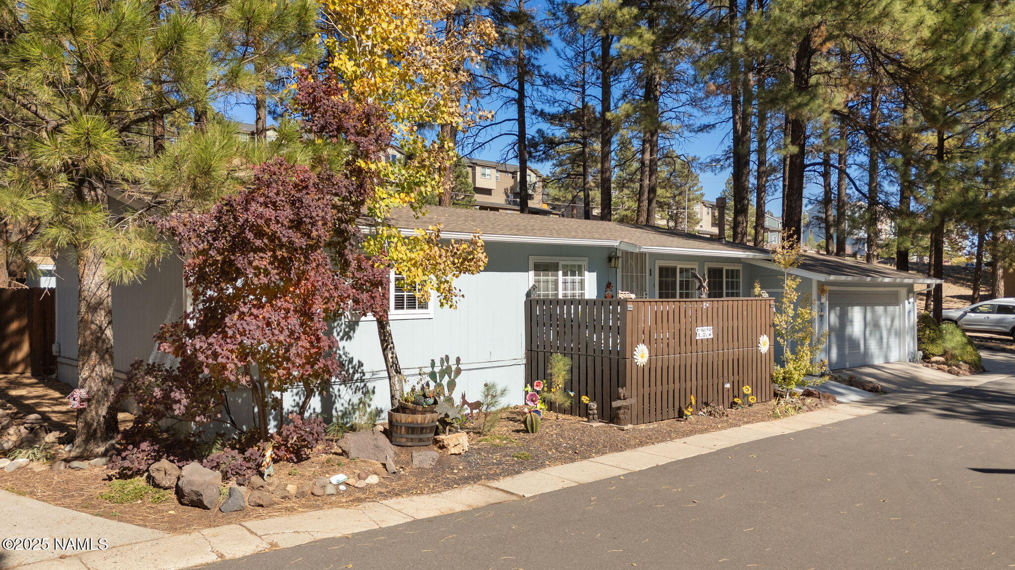 2401 West Rte 66 Flagstaff, AZ 86001 - Photo 6 of 47 a front view of a house with a yard