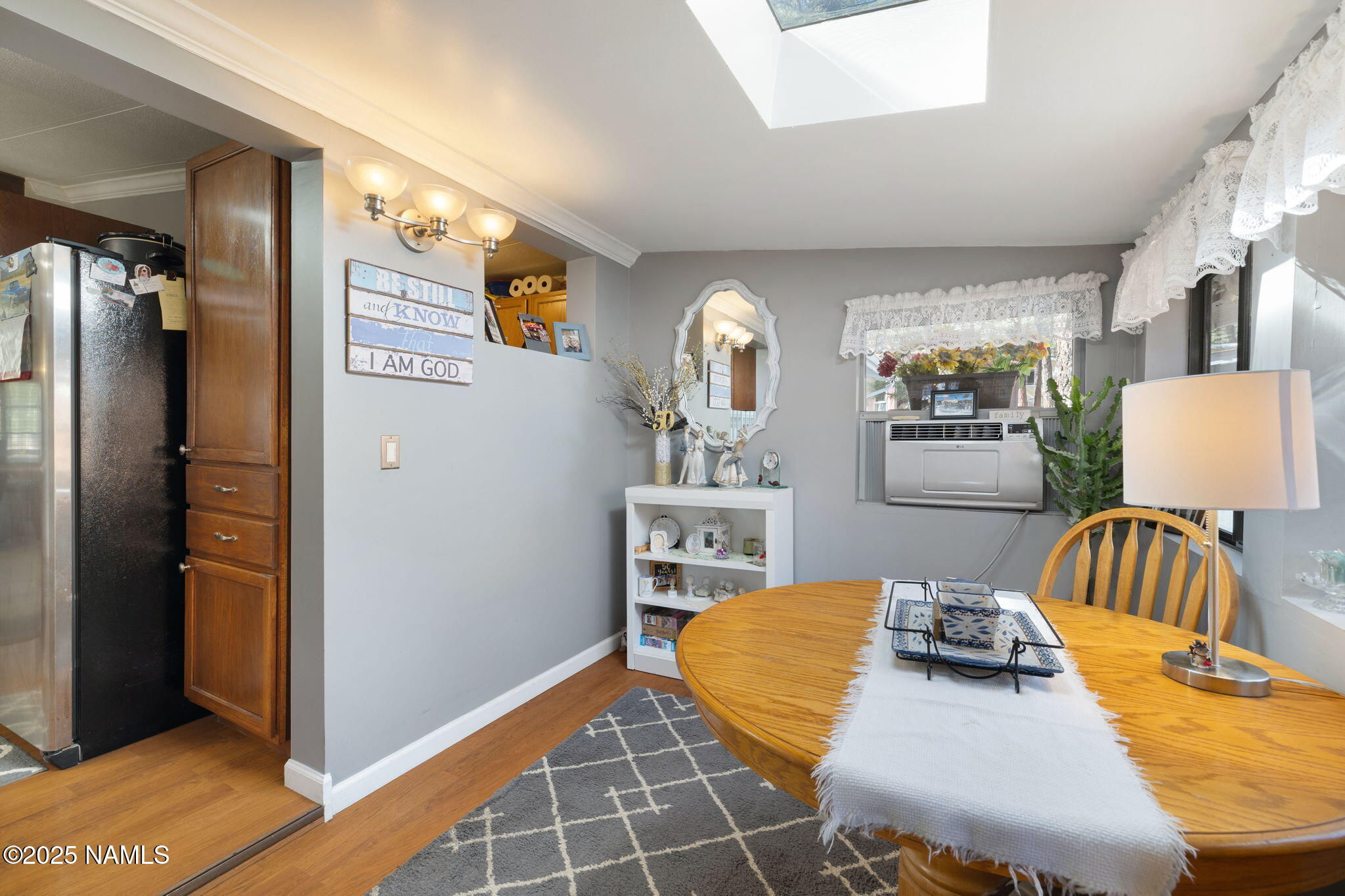 2401 West Rte 66 Flagstaff, AZ 86001 - Photo 10 of 47 a bedroom with furniture and a lamp