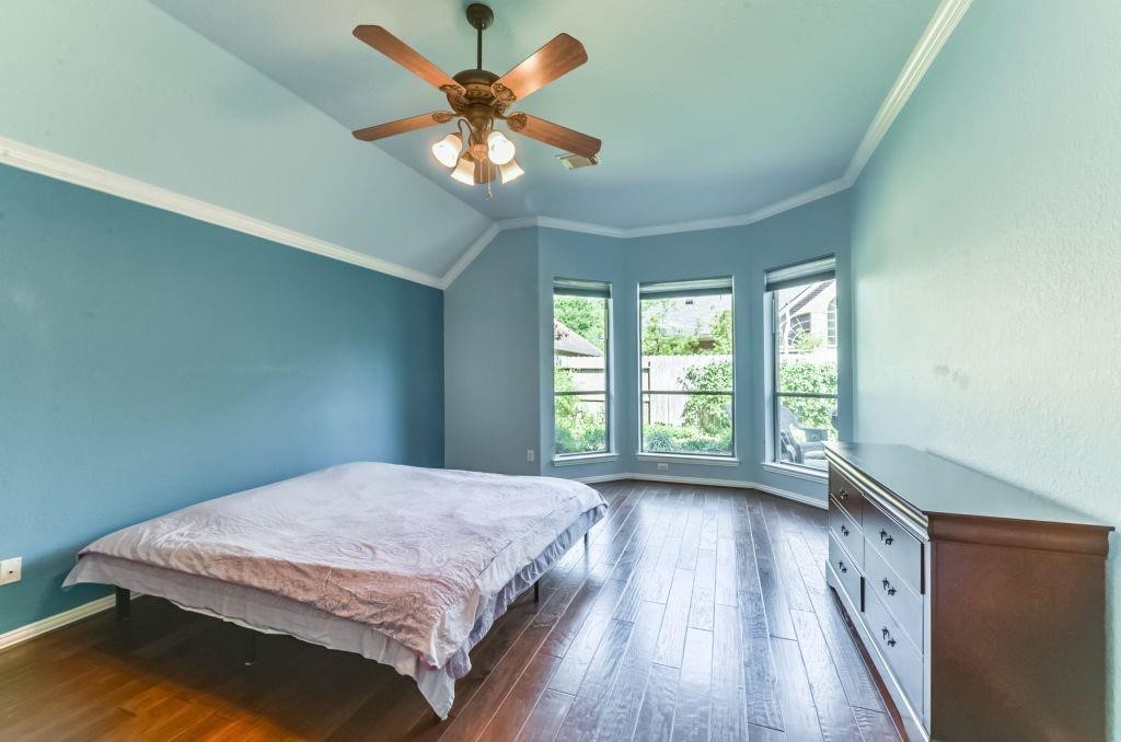 31 North Warbler Bend Circle Spring, TX 77382 - Photo 18 of 31 a bedroom with a bed and a window