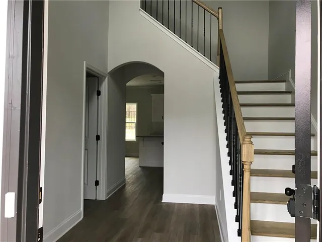 an empty room with closet area