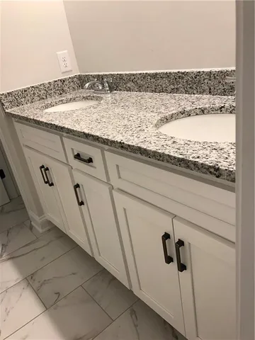 a bathroom with a shower and a toilet