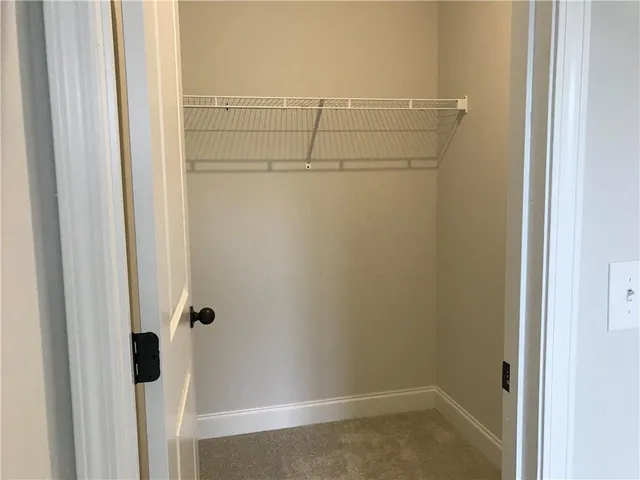 a empty closet with a window
