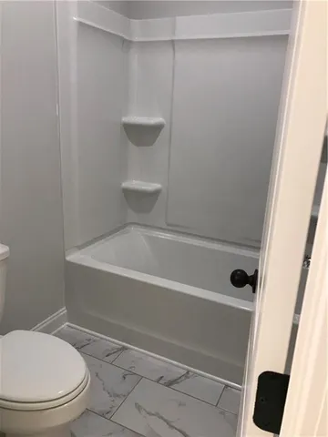 a view of a livingroom with a fireplace