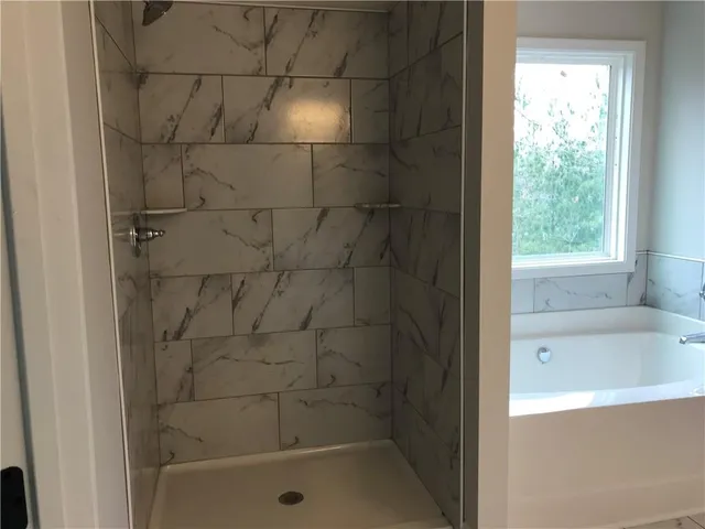 a kitchen with granite countertop a sink and a stove