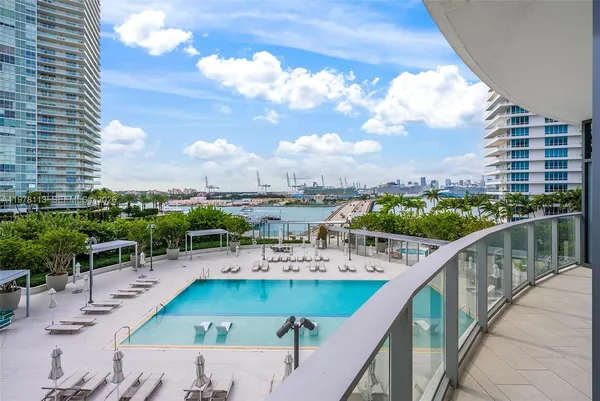 a view of swimming pool from a balcony