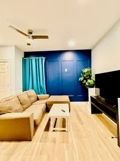 a bedroom with a bed and a couch