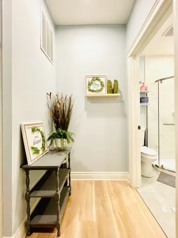 a bedroom with a bed and a table in it