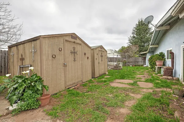 a view of a back yard of the house