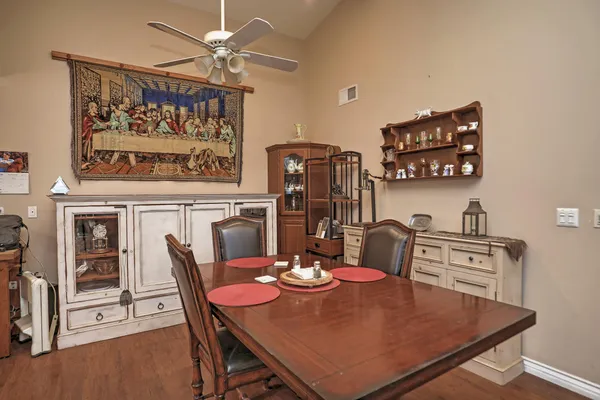 a view of a dining room with furniture