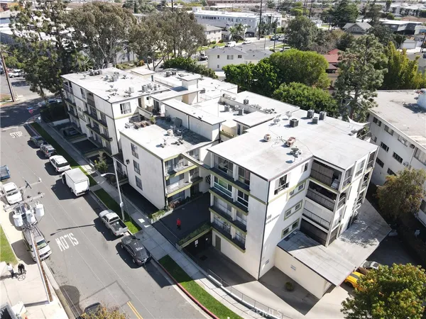 an aerial view of a multi story parking space