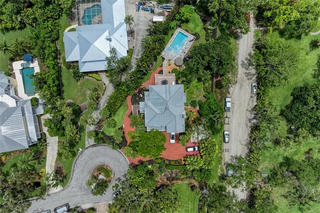 a view of balcony with wooden floor and fence