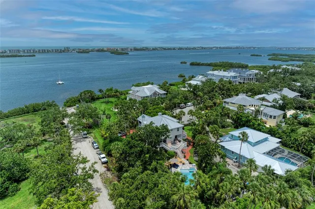 a kitchen with a wooden floor and white appliances