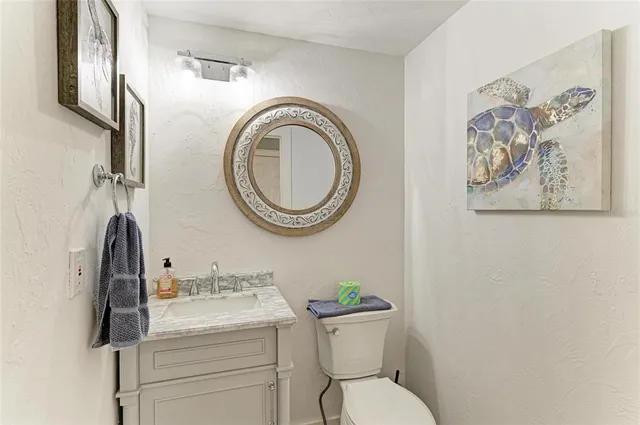 a front view of a house with wooden floor and stairs