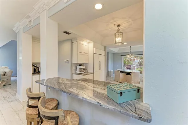 a bedroom with a bed and walk in closet