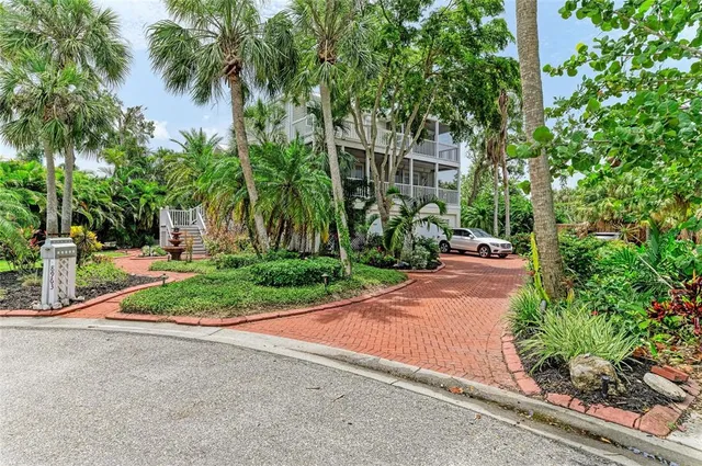 a spacious bedroom with a bed and a large window