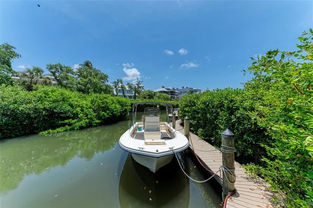 a view of balcony with furniture and wooden floor