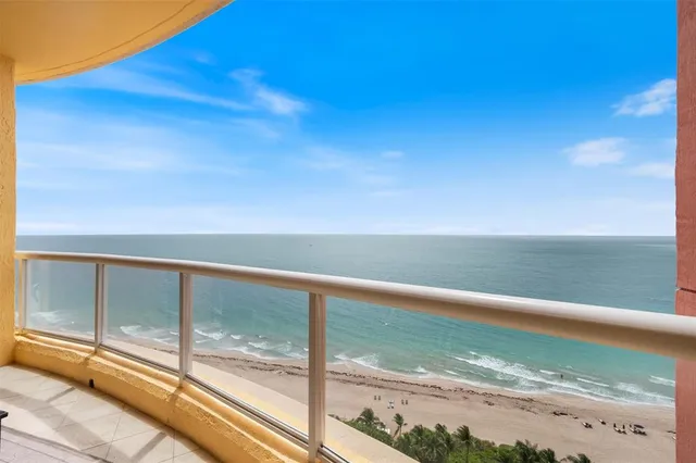 a view of ocean from a balcony