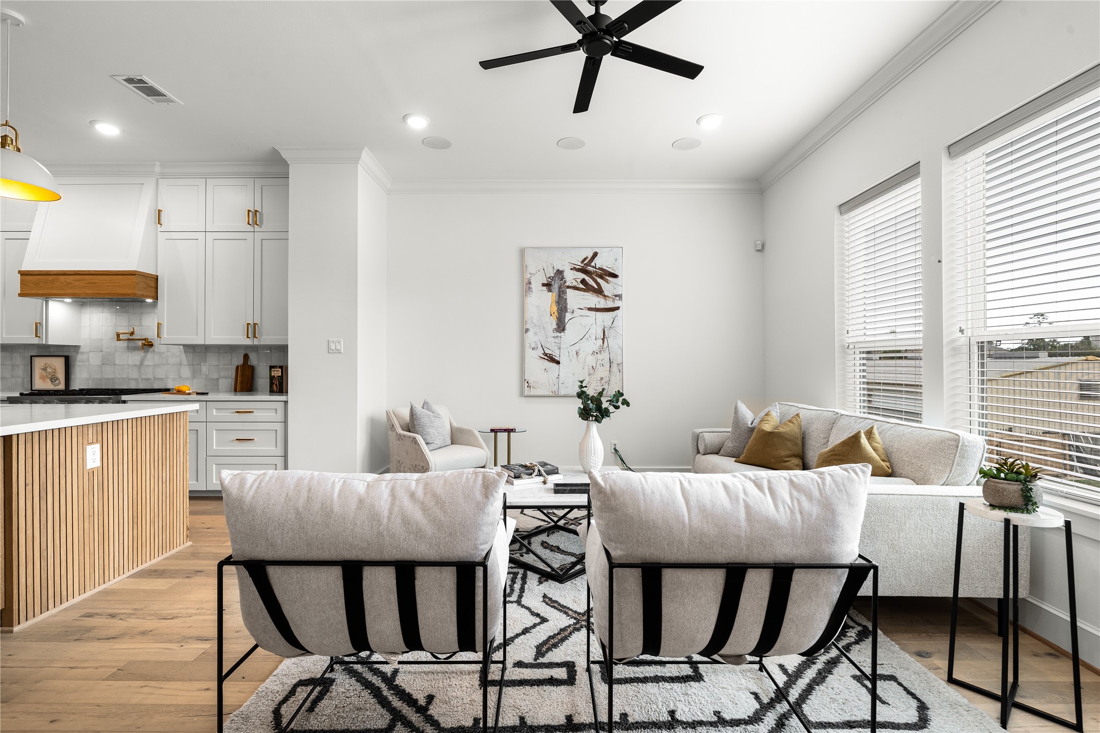 1614 Ojeman Road, Unit E Houston, TX 77055 - Photo 12 of 50 The living room is stylishly furnished with neutral tones and contemporary decor.