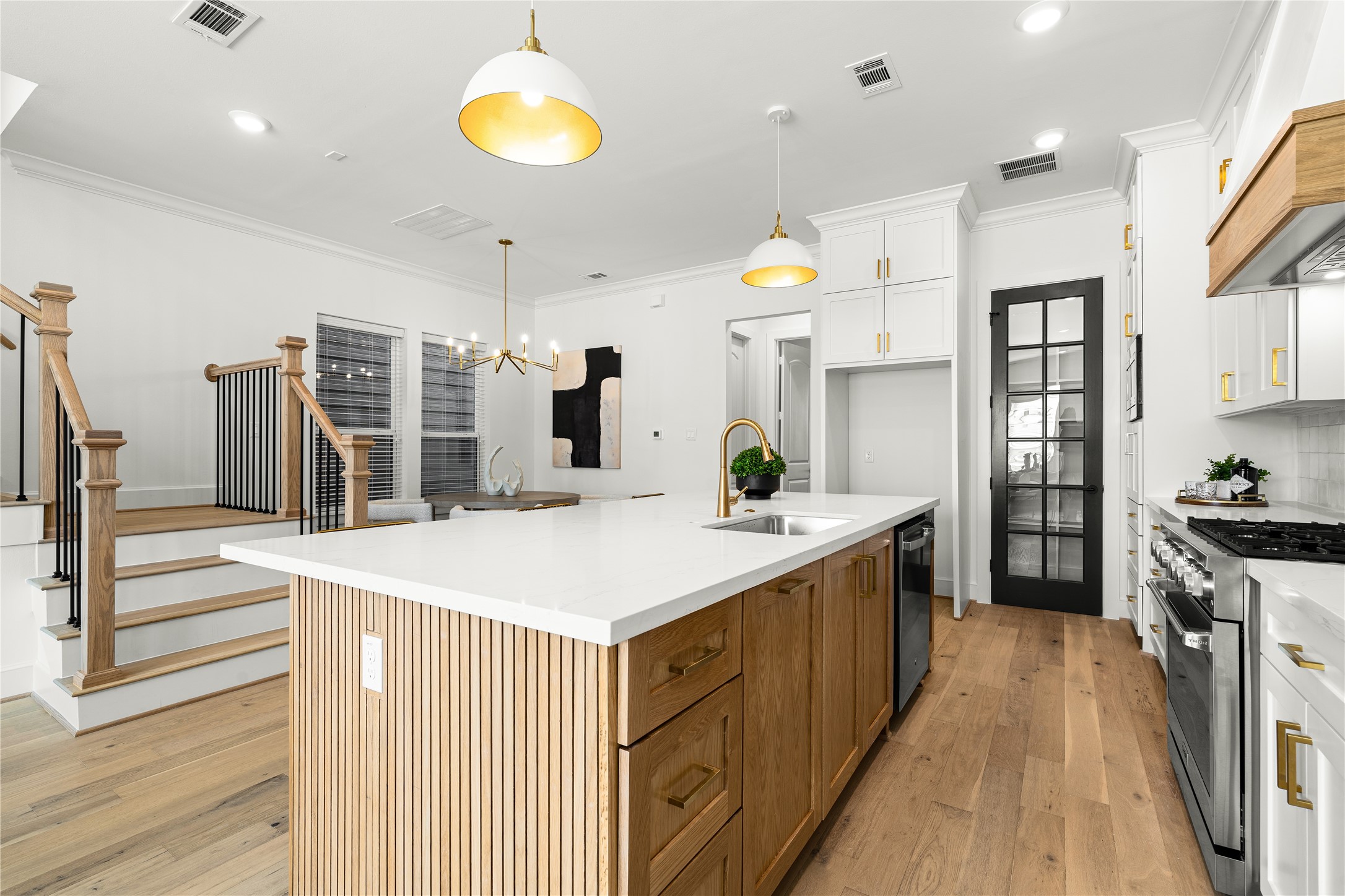 1614 Ojeman Road, Unit E Houston, TX 77055 - Photo 20 of 50 Central island with wood accents throughout.