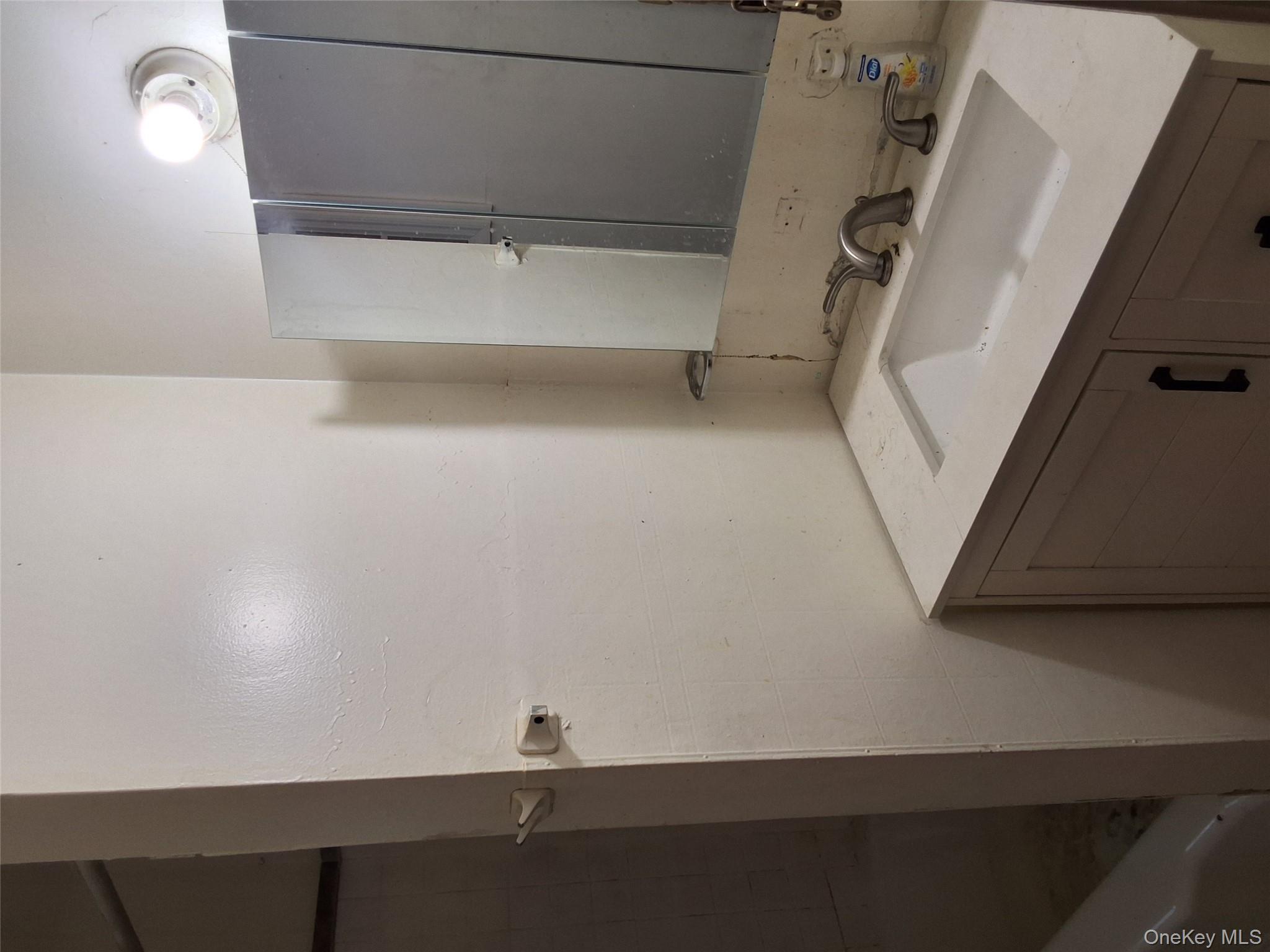 84 North Road Bloomingburg, NY 12721 - Photo 13 of 14 a bathroom with a sink and a mirror