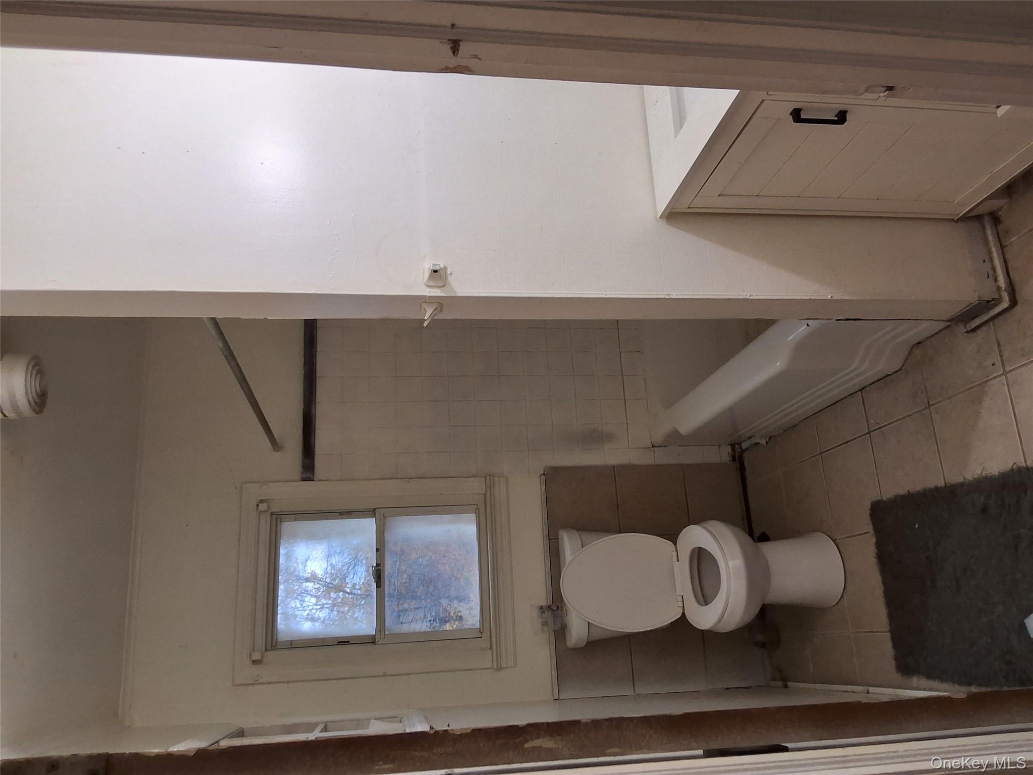 84 North Road Bloomingburg, NY 12721 - Photo 14 of 14 a bathroom with a toilet and a shower