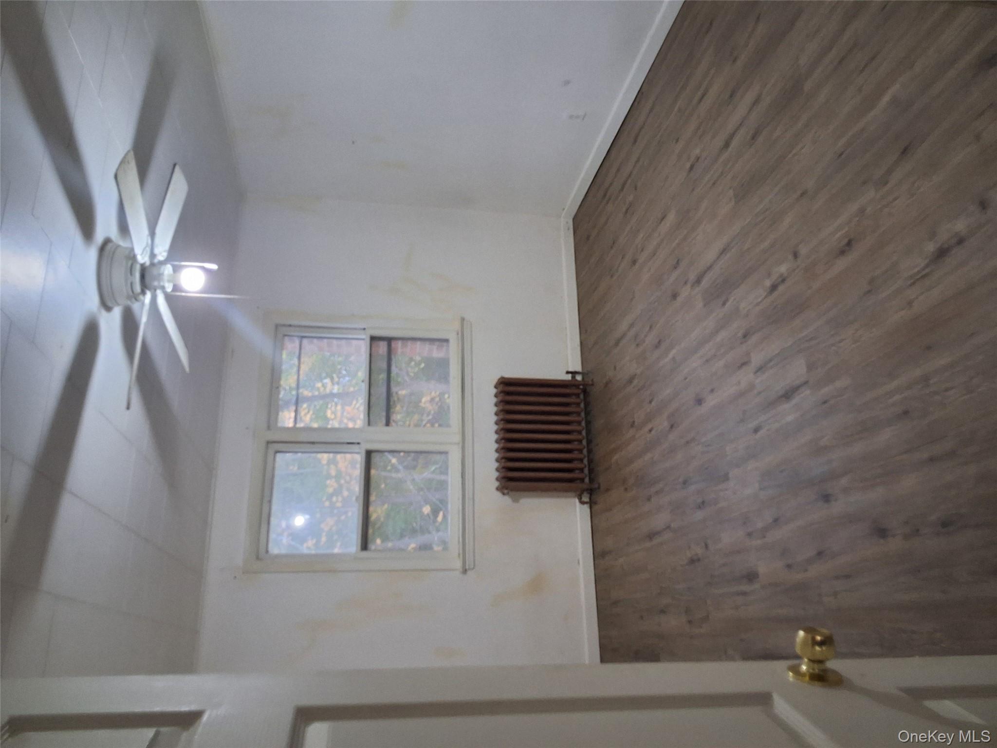 84 North Road Bloomingburg, NY 12721 - Photo 3 of 14 wooden floor in an empty room with a window