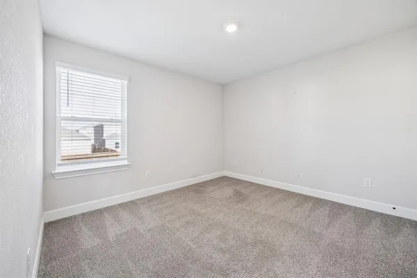 an empty room with a window