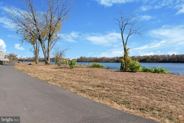 a view of a lake from a yard