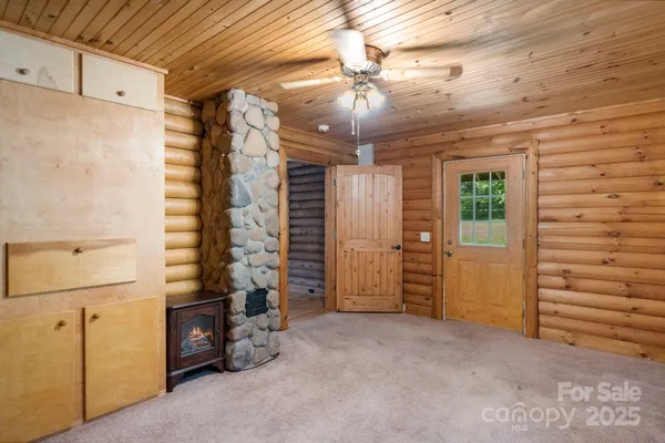 a view of entryway with wooden wall